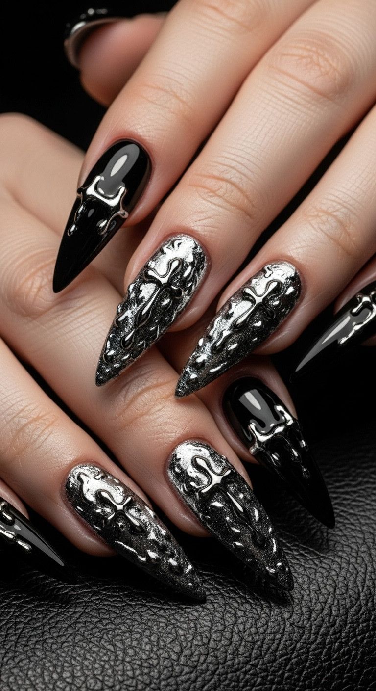 Edgy stiletto goth girl chrome detail nails on a dark leather background for a textural look