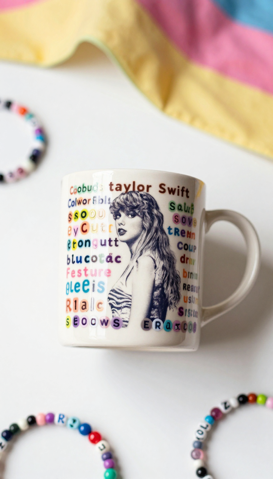 Eras Tour friendship bracelet mug with colorful bead designs spelling album titles against white background